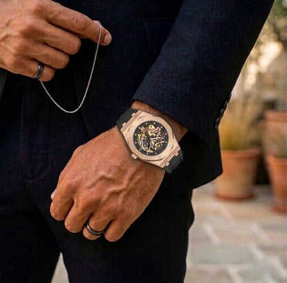 Man wearing Noble Oak rose gold watch with black suit