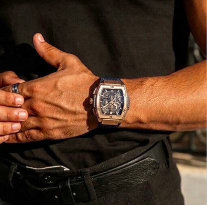 Man wearing the rose gold Apex skeletonised tonneau watch