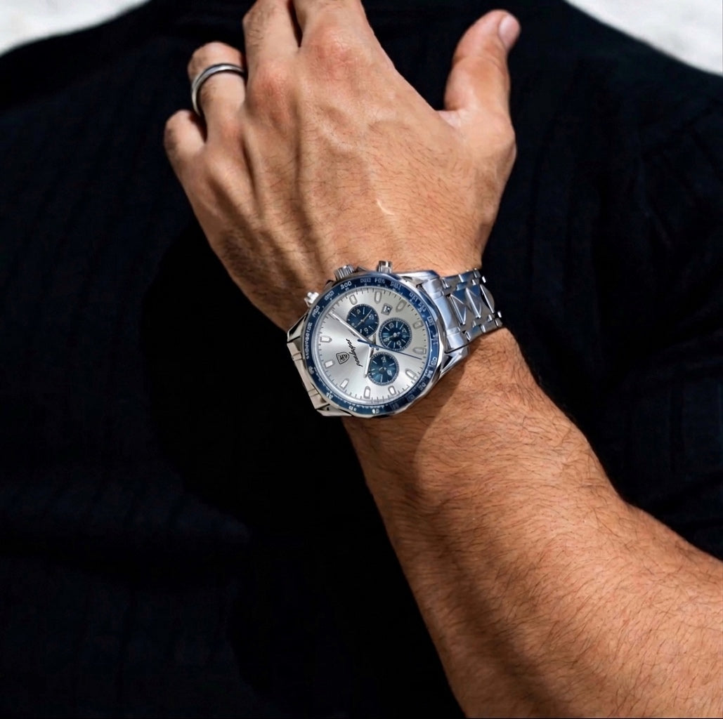 Rivale watch on man's wrist with stainless steel band and chronograph dial
