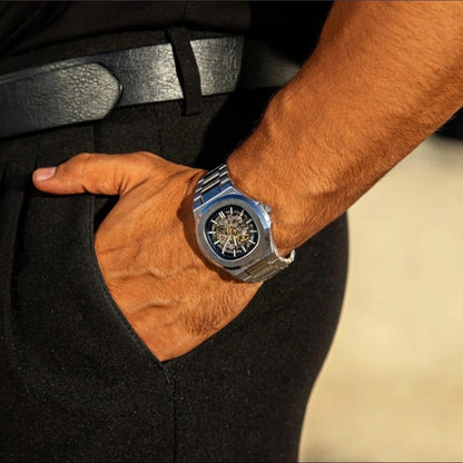 Skeleton automatic watch on man's wrist