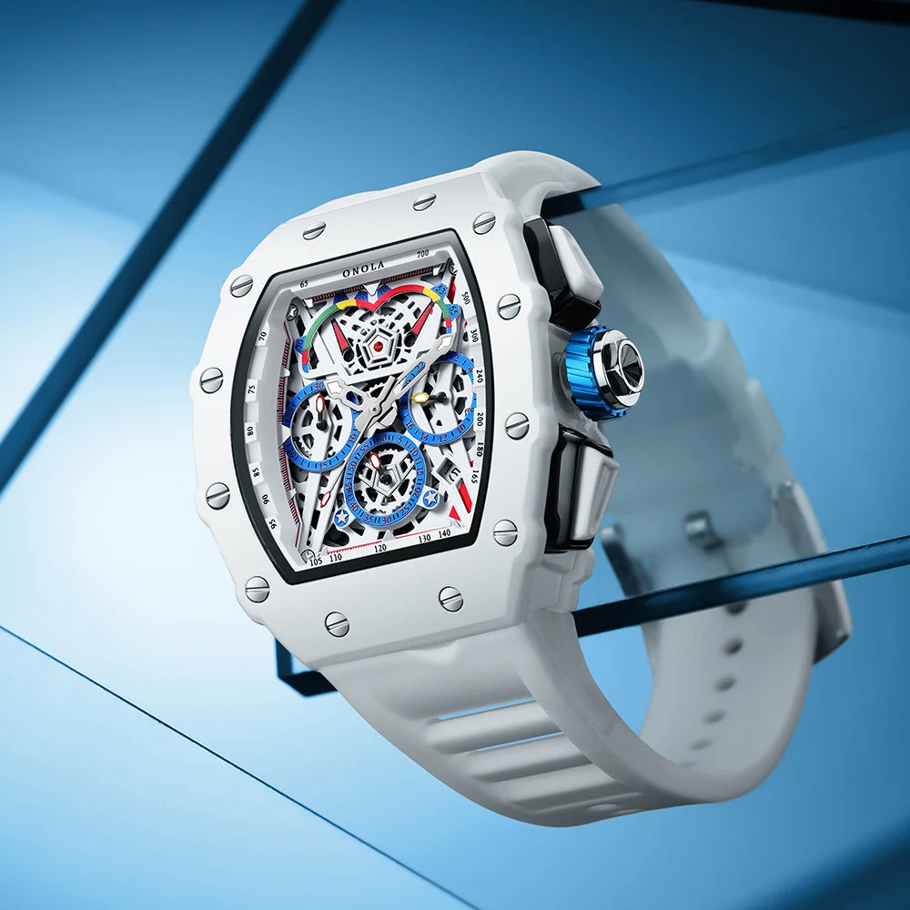 White skeleton dial watch with blue accents and rubber strap